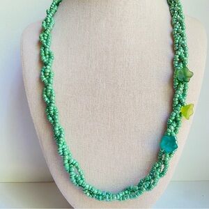Braided glass seed bead necklace with frosted flower accents pearlescent green